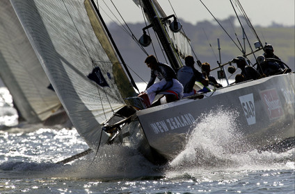 03_0214D ©Th.Martinez - Auckland (NZ) . America's Cup 2003. 18th February 2003. Day 2..Alinghi (SUI 64) vs Team NZ (NZL 82) .NZL 82 leading  SUI 64 at mark 3. Alinghi will over take Team NZ in the last leg and win with 7s on Team NZ...