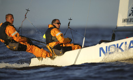 03_3214D 03_3210D © Th.Martinez,STOCKHOLM - SWEDEN10 07 03-Archipelago Raid (2003). Leg4: Marieham (Finland) TO Fejan (SWE). Team Nokia - Kempff , Magnus Nordstrom looking at the map and Joakim Kempff at the helm.