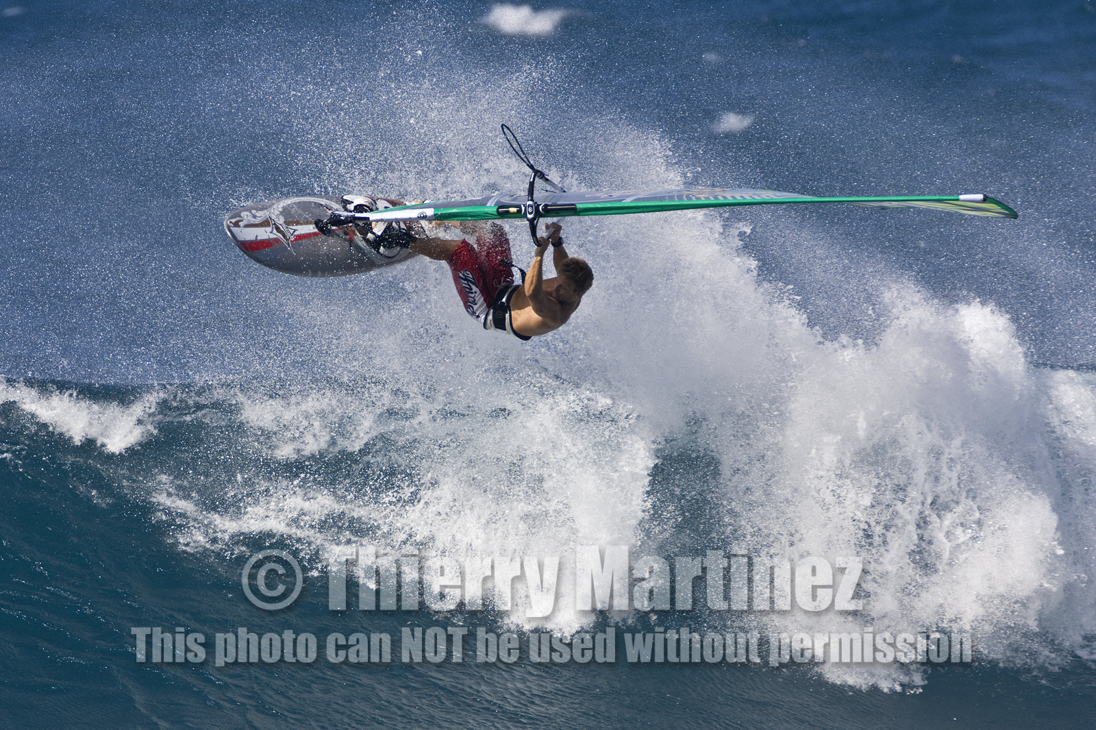 Windsurf in waves at Hookip'a Beach - North Shore Maui - Hawaii.