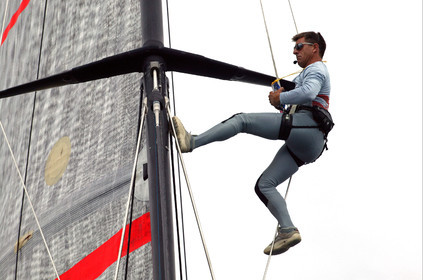 03_1011D © Th.Martinez . Auckland   New Zealand. 20th February 2003 America's Cup 2003, .Day 4 Race cancelled Alinghi(SUI64) vs Team New Zealand(NZL82) .Murray Jones in the mast looking for breeze.