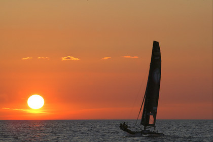 03_3186D © Th.Martinez,STOCKHOLM ARCHIPELAGO SWEDEN,9 07 03-Archipelago Raid (2003)  Leg 2.First sunrise on Archipelago Raid 2003. TIDERMANS Anders Lewander (SWE) & Calle Hendix (SWE)