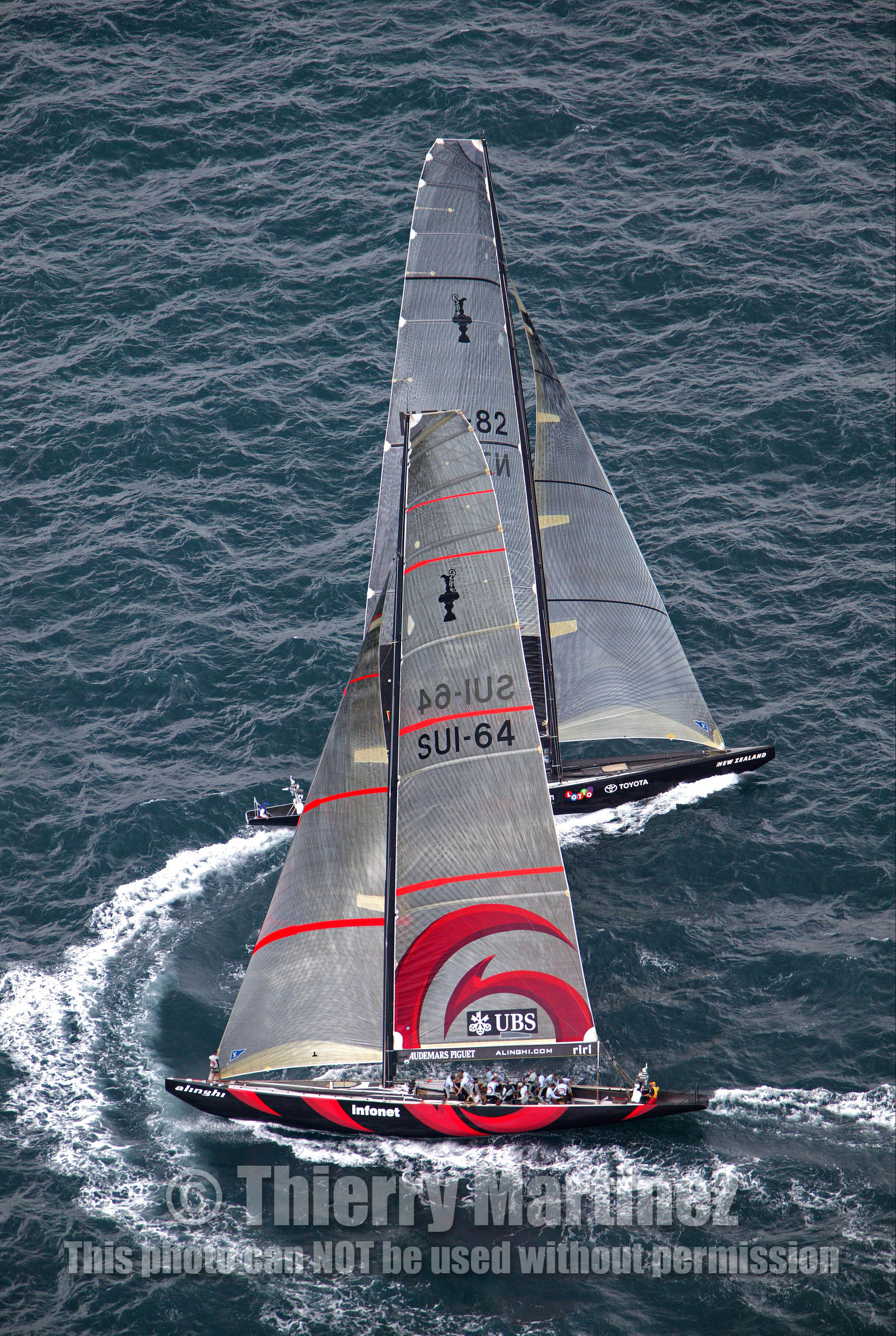 03_0971D © Th.Martinez . Auckland   New Zealand. 18th February 2003 America's Cup 2003, Day 3 Alinghi(SUI64) vs Team New Zealand(NZL82) Start