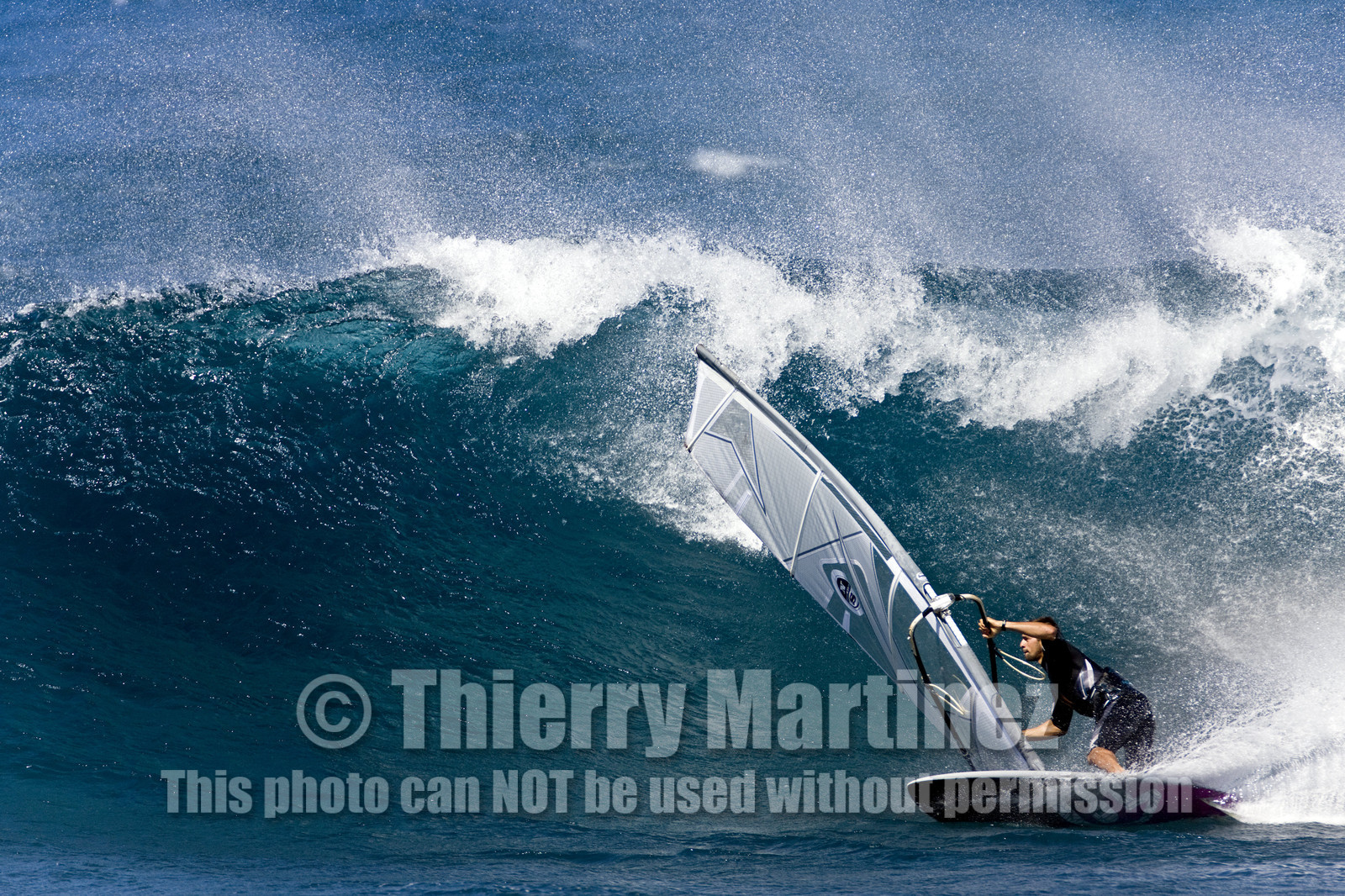 Windsurf in waves at Hookip'a Beach - North Shore Maui - Hawaii.