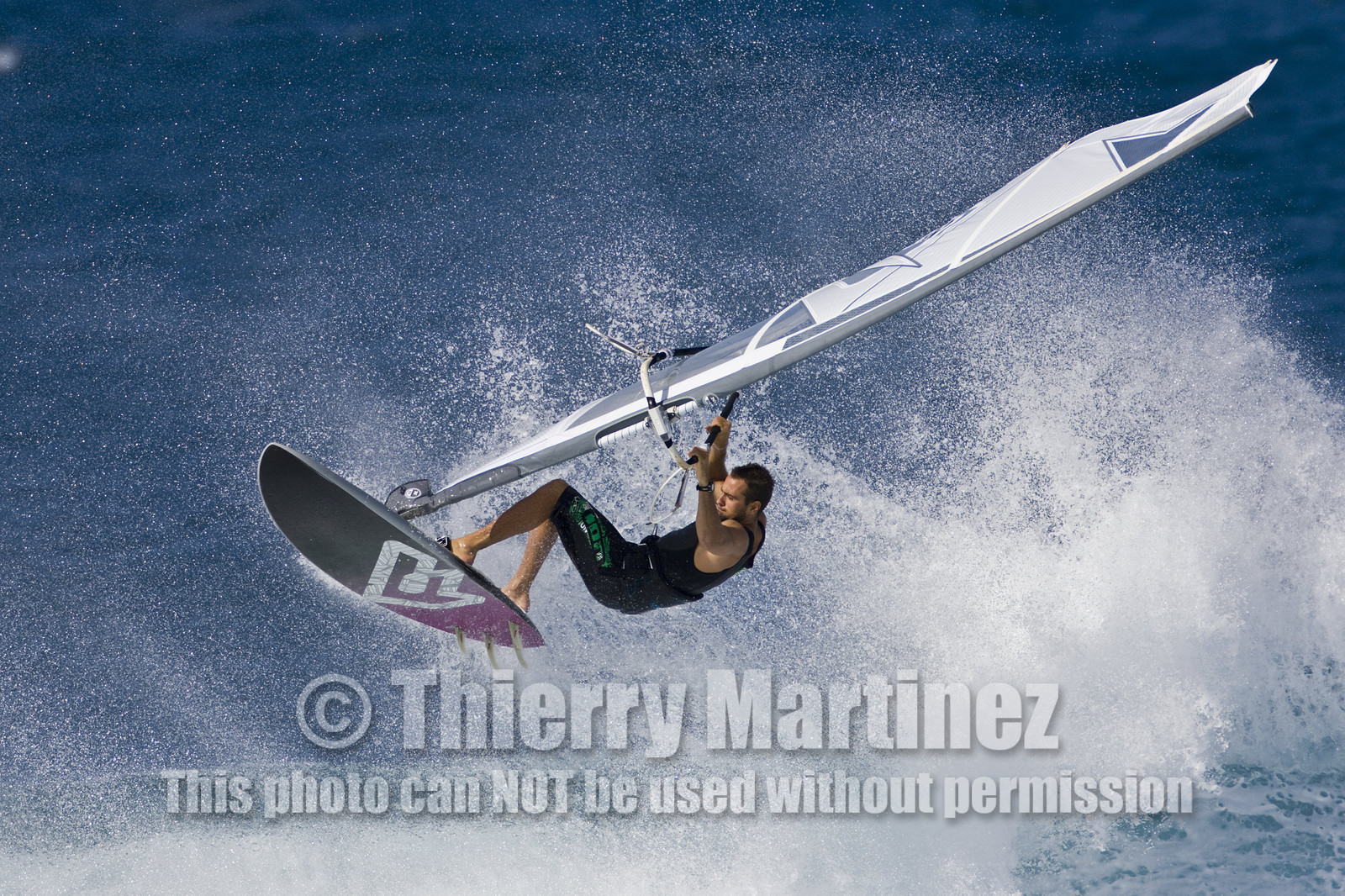 Windsurf in waves at Hookip'a Beach - North Shore Maui - Hawaii.