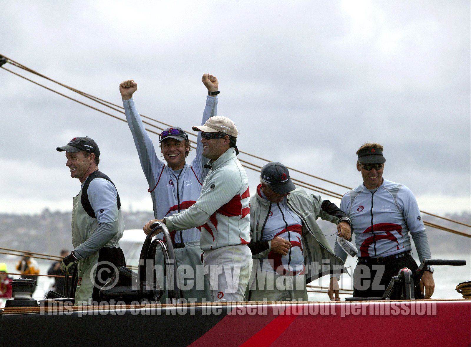 03_1468D © Th.Martinez . Auckland   New Zealand. 2nd March 2003 America's Cup 2003. Day 5, Alinghi (SUI64) vs Team New Zealand (NZL82). Alinghi winner of the 31st America's Cup. Ernesto Bertarelli (President and navigator) very happy after the Victory of Alinghi Team in America's Cup 2003. Russell Coutts(Skipper) at the helm.