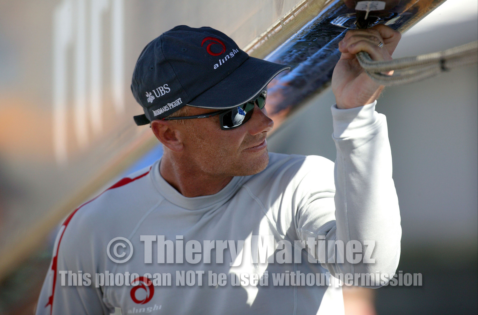 03_0922D © Th.Martinez  Auckland   New Zealand. 16 February 2003 America's Cup Day 2.Alinghi (SUI64) vs Team New Zealand (NZL82)Alinghi trimmer, Richard Bouzaid.