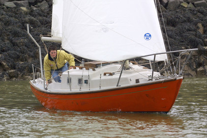 ©ThMartinez. Vendee Globe Finish..Ellen MacArthur (UK) KINGFISHER sailing on the small boat which she did round Briatin .when she was 16 years old. It's the first time since 5 years, she was ailing that boat..Ellen was very happy . Her team did a surprise to Ellen when they carries the boat from UK to .the Vendee Globe finish.