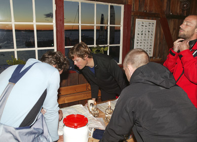 03_3260D © Th.Martinez,STOCKHOLM SWEDEN, 10 07 03-Archipelago Raid (2003) Day 3. Fejan (SWE).last look at maps before the night start in Fejan.