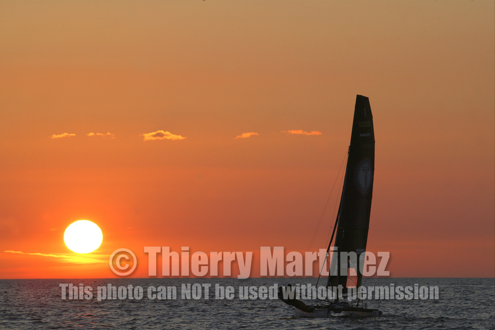 03_3186D © Th.Martinez,STOCKHOLM ARCHIPELAGO SWEDEN,9 07 03-Archipelago Raid (2003)  Leg 2.First sunrise on Archipelago Raid 2003. TIDERMANS Anders Lewander (SWE) & Calle Hendix (SWE)