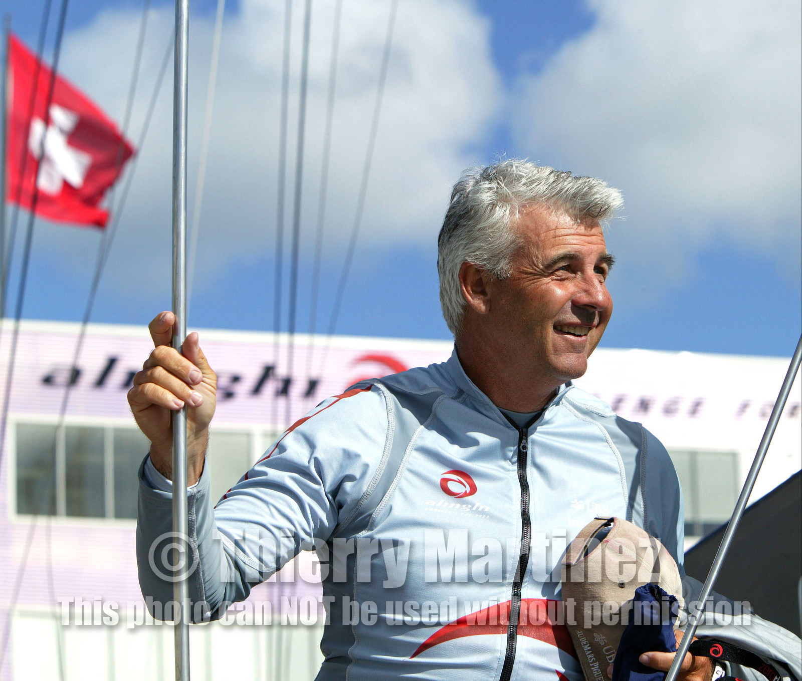 03_0871D © Th.Martinez. Auckland   New Zealand. 15 02 03 America's Cup Day 1.Alinghi (SUI64) vs Team New Zealand (NZL82)Alinghi Team onboard SUI64 leaving the dock for the first race day of .the America's Cup 2003. Alinghi Tactitian, Brad Butterworth.