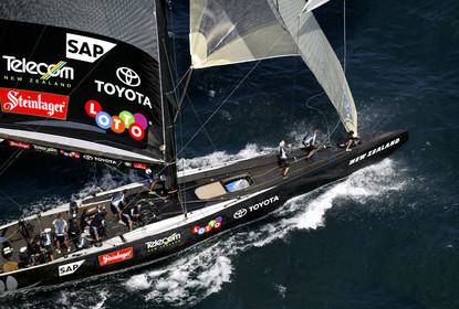 03_0194D ©Th.Martinez - Auckland (NZ) . America's Cup 2003. 18th February 2003. Day 3..Alinghi (SUI 64) vs Team NZ (NZL 82) .Team NZ 's crew droping head sail after setting up spinnaker at upwind mark...