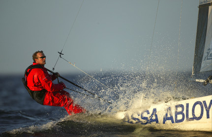03_3217D © Th.Martinez,STOCKHOLMSWEDEN10 07 03-Archipelago Raid (2003). Leg 4, Marieham (Finland ) to Fejan (Sweden). Neal McDonad at the helm of ASSA ABLOY