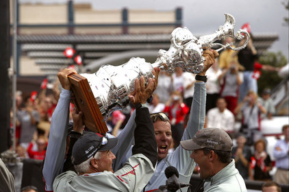 03_1423D © Th.Martinez . Auckland   New Zealand. 2nd March 2003 America's Cup 2003. Day 5, Alinghi (SUI64) vs Team New Zealand (NZL82). Alinghi winner of the 31st America's Cup (5-0). Docking ceremony, presentation of the America's Cup in the Viaduct Bassin. .Brad Butterworth, Jochen Schuemann, and Russell Coutts, holding The America's Cup.