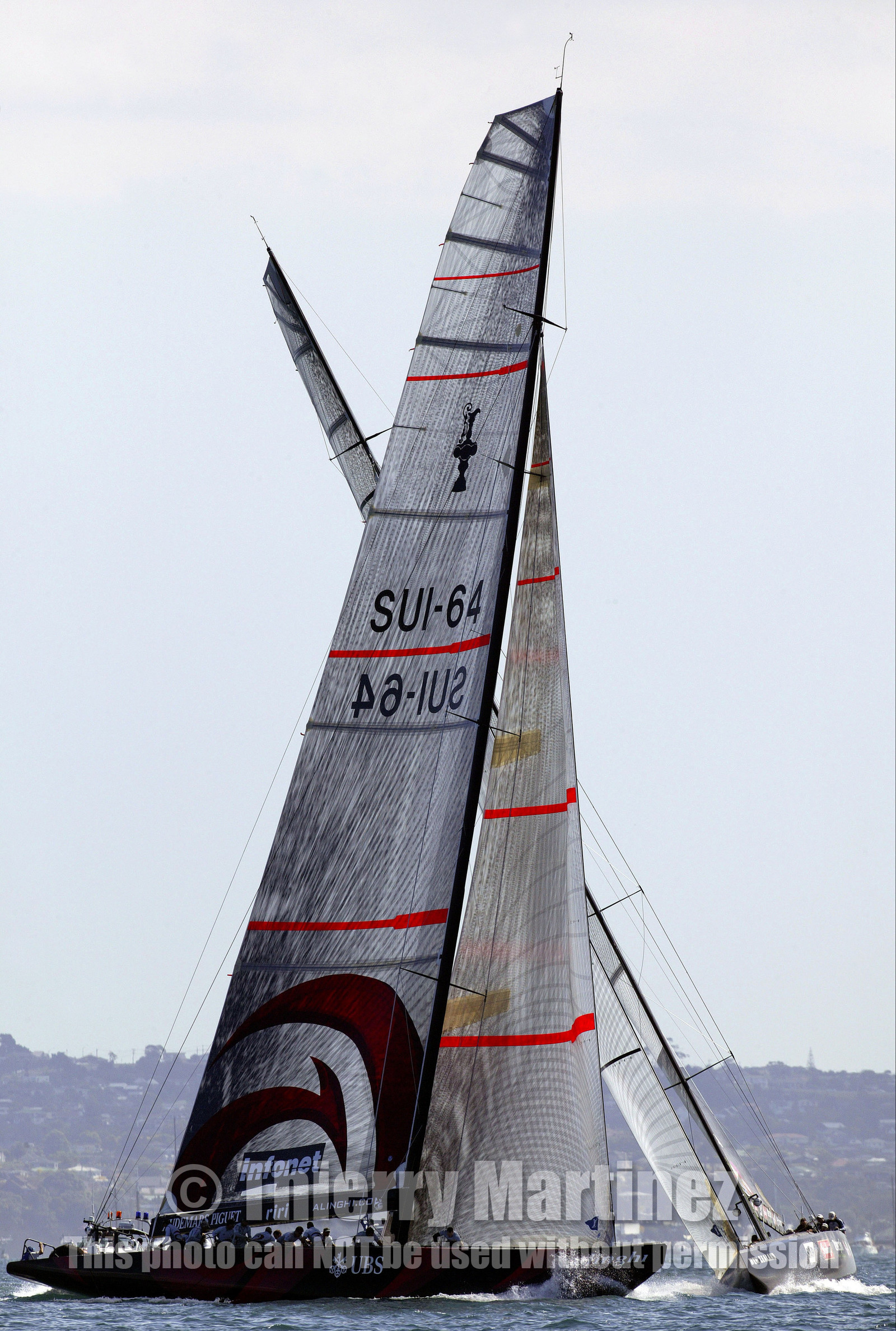 03_0936D © Th.Martinez  Auckland   New Zealand. 16 February 2003 America's Cup 2003, Day 2.Alinghi (SUI64) vs Team New Zealand (NZL82).SUI 64 leading in first upwind leg.