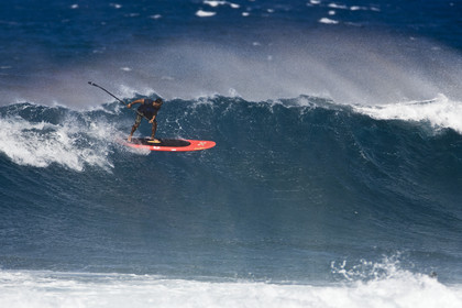 Stand Up Paddle  in waves at Hookip'a Beach - North Shore Maui - Hawaii.