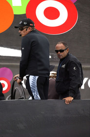 03_0244D ©Th.Martinez - Auckland (NZ) . America's Cup 2003. 20th February 2003. Day 4 Cancelled..Alinghi (SUI 64) vs Team NZ (NZL 82) .Team NZ's skipper Dean Barker at the helm of NZL 82, with frenchman Bertrand Pace (Tactician, on place of Hamish Pepper) for first time on board for America's Cup. Bertrand Pace is the first French sailor to race in n America's Cup match and is the helmsman of NZL 81. The race had been cancelled for wind not enough stable. Race 4 should start on Saturday 22th February...