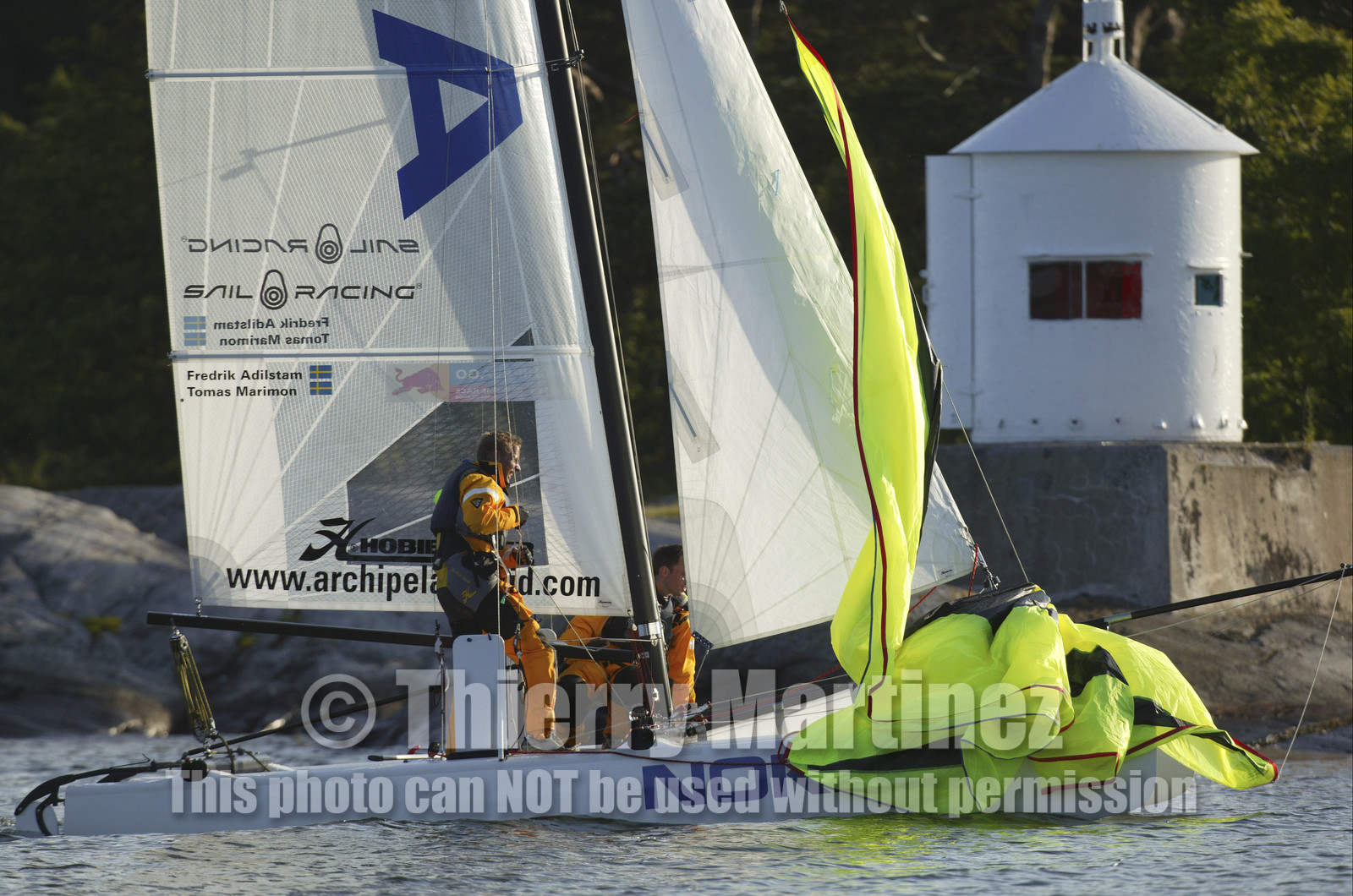 03_3085D   © Th.Martinez,STOCKHOLM ARCHIPELAGO SWEDEN, 8 07 03-Archipelago Raid (2003)  Day 1. Team NOKIA-Adilstam  .Frederik Aldistam (SWe) and Tomas Marimon (SWE)  at finish of leg 1.