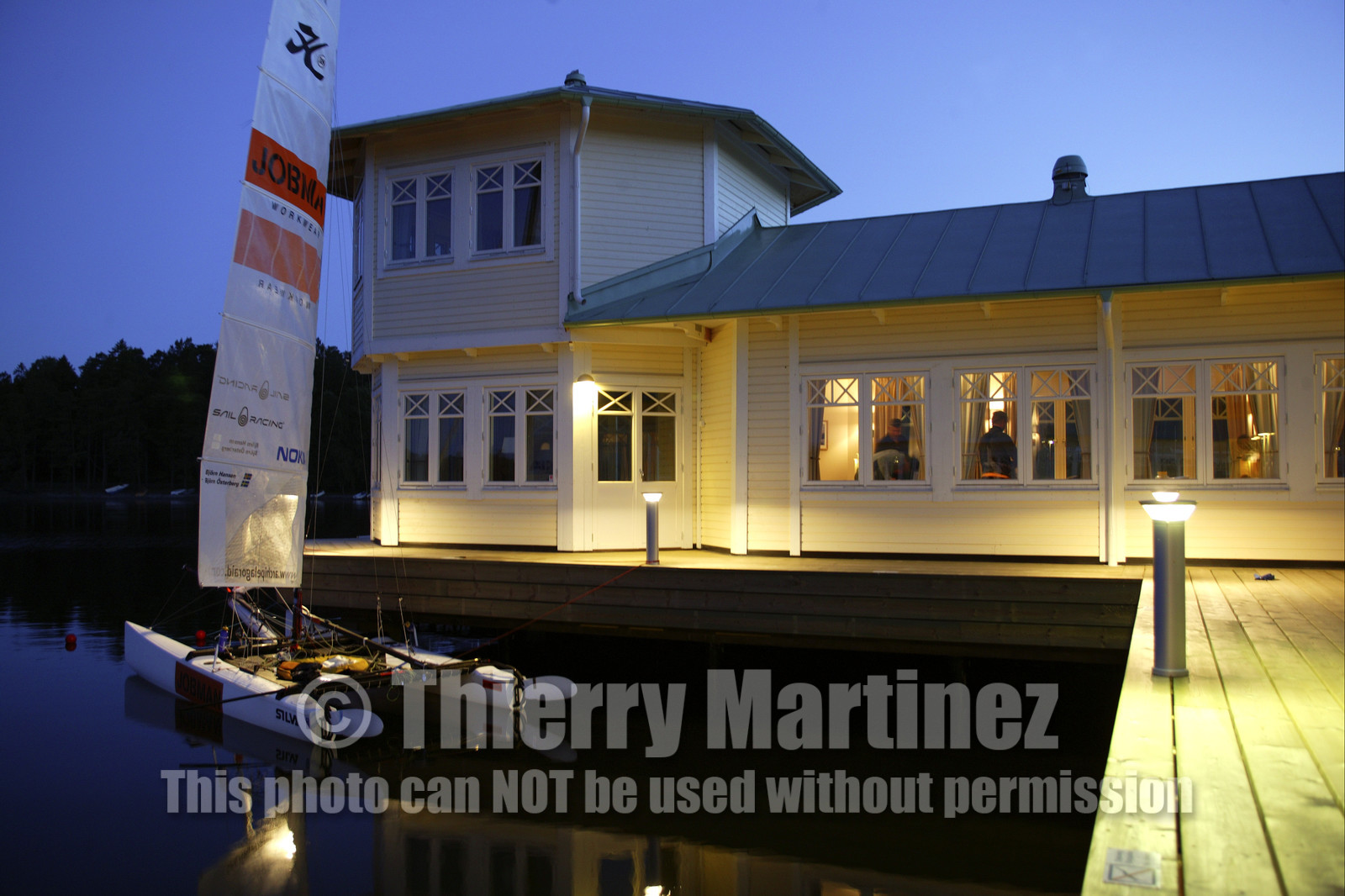 03_3174D © Th.Martinez,STOCKHOLM SWEDEN, 8 07 03-Archipelago Raid (2003).Nynäshamn..Stop in first HQ. JOBMAN's cat at the pontoon of Nynäs-havsbad hotel