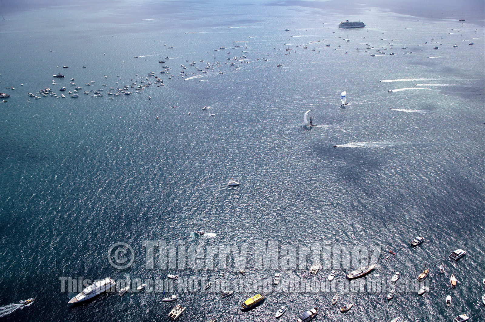 03_0964D © Th.Martinez . Auckland   New Zealand. 18th February 2003 America's Cup 2003, Day 3 Alinghi(SUI64) vs Team New Zealand(NZL82) Finish line.