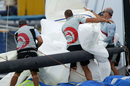 03_1012D © Th.Martinez . Auckland   New Zealand. 20th February 2003 America's Cup 2003, Day 4 Race cancelled Alinghi(SUI64) vs Team New Zealand(NZL82) Crew  dropping the spinnaker.