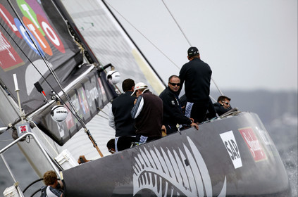 03_0241D ©Th.Martinez - Auckland (NZ) . America's Cup 2003. 20th February 2003. Day 4 Cancelled..Alinghi (SUI 64) vs Team NZ (NZL 82) .Team NZ's skipper Dean Barker at the helm of NZL 82, with frenchman Bertrand Pace (Tactician, on place of Hamish Pepper) for first time on board for America's Cup. Bertrand Pace is the first French sailor to race in n America's Cup match and is the helmsman of NZL 81. The race had been cancelled for wind not enough stable. Race 4 should start on Saturday 22th February...
