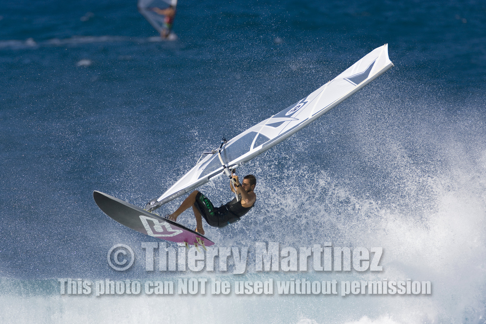 Windsurf in waves at Hookip'a Beach - North Shore Maui - Hawaii.