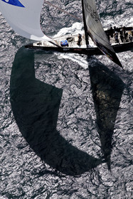 03_0204D ©Th.Martinez - Auckland (NZ) . America's Cup 2003. 18th February 2003. Day 3..Alinghi (SUI 64) vs Team NZ (NZL 82) .Team NZ's crew droping head sail in 2nd Downwind leg...