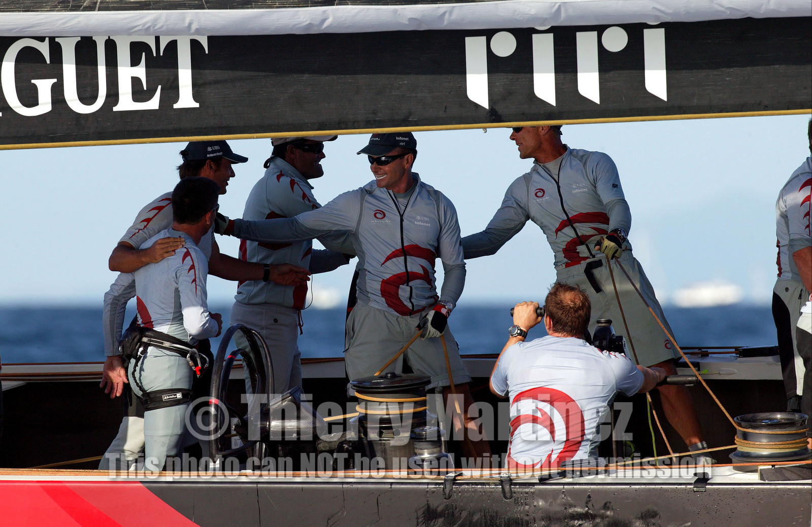 03_0958D © Th.Martinez  Auckland   New Zealand. 16 February 2003 America's Cup 2003, Day 2.Alinghi (SUI64) vs Team New Zealand (NZL82) SUI64 crew happy after the second victory over Team New Zealand.