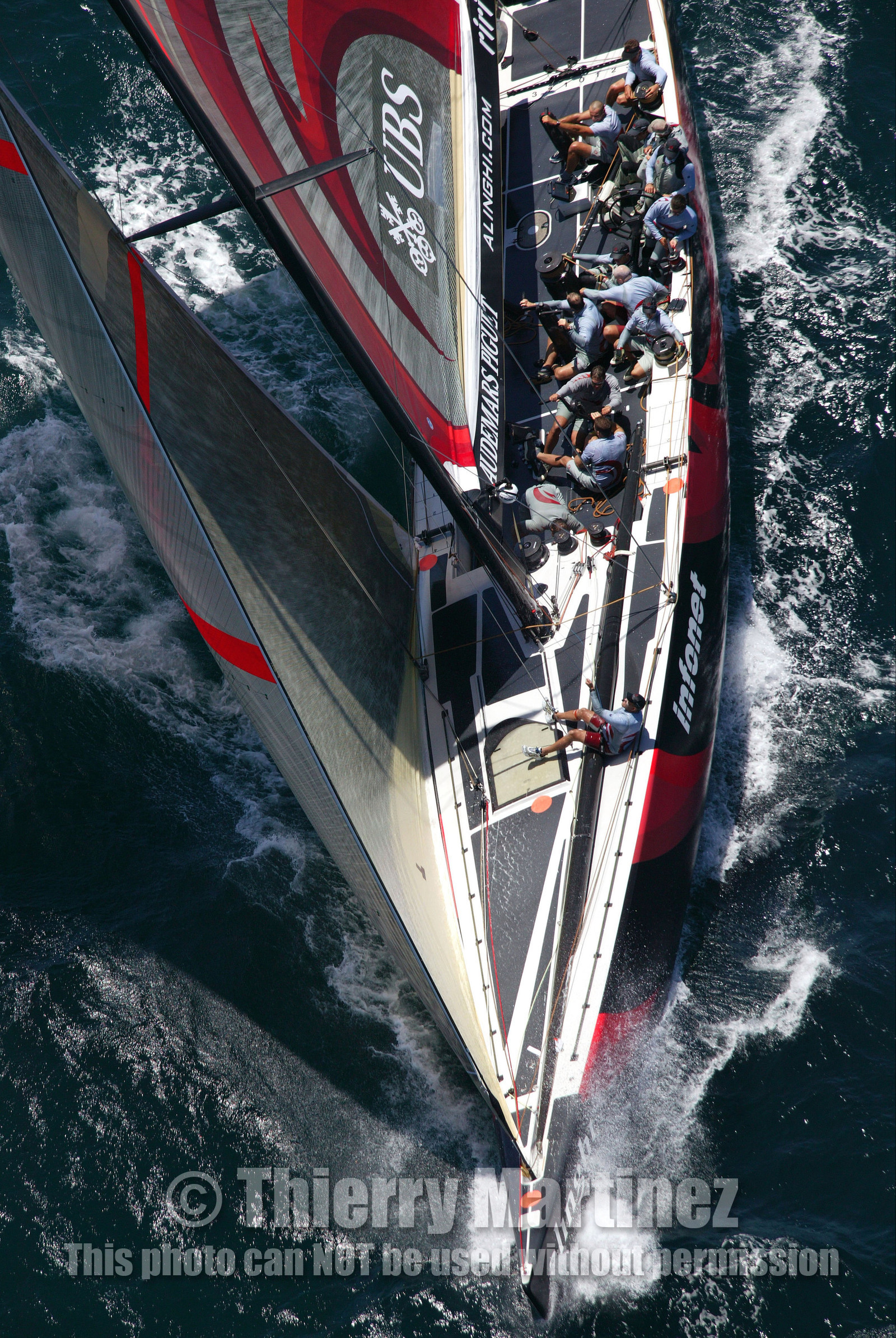 03_0902D © Th.Martinez. Auckland   New Zealand. 15 02 03 America's Cup Day 1.Alinghi (SUI64) vs Team New Zealand (NZL82) SUI64 going alone upwind after retirement of NZL82,.suffering of gear damages.